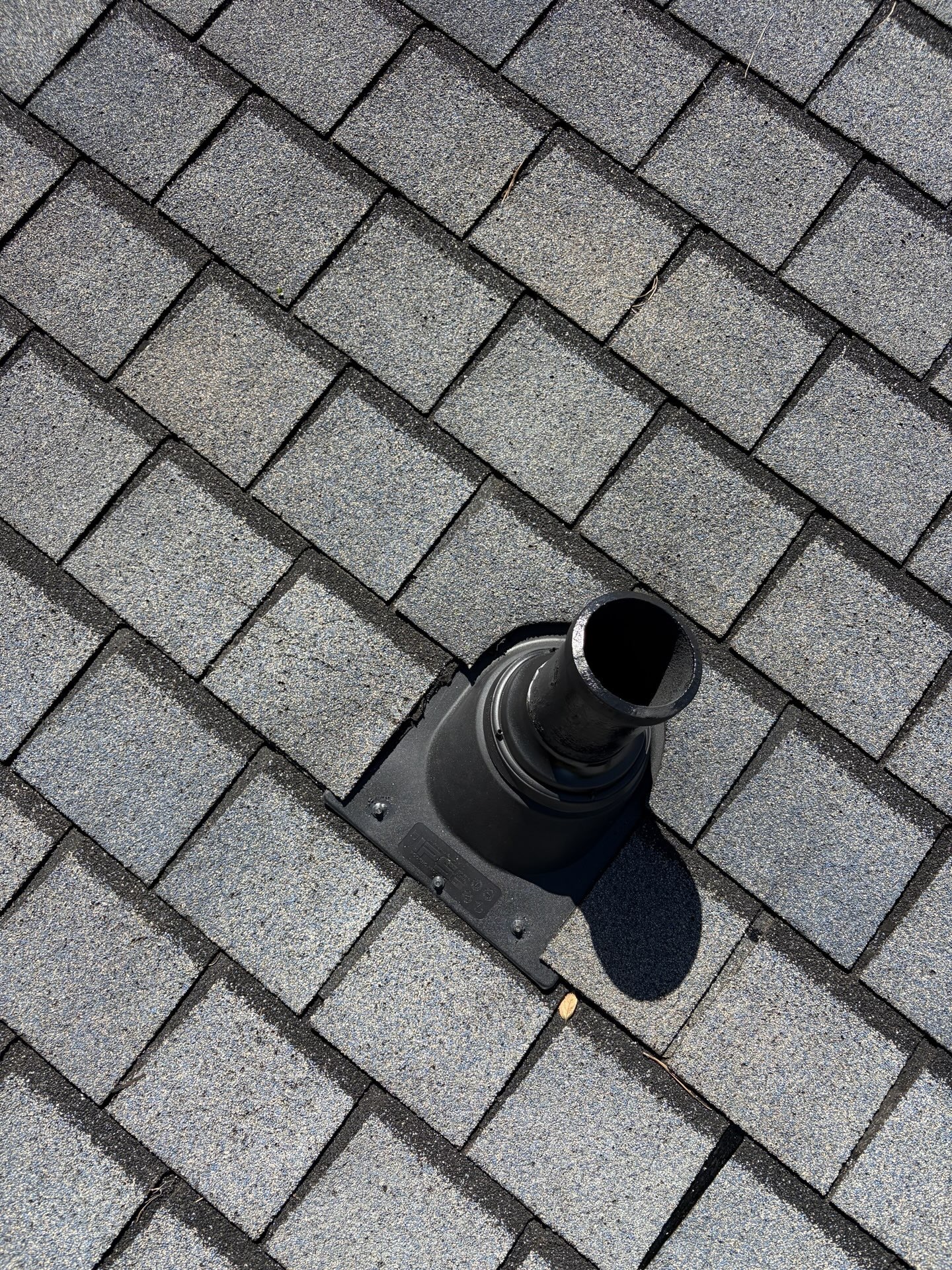 Plumbing pipe boot repair on an asphalt shingle roof in Fayetteville, GA