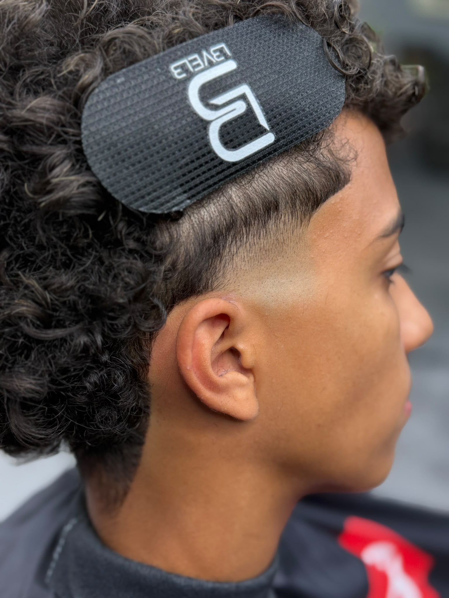 Low Taper Fade & Rizos Definidos