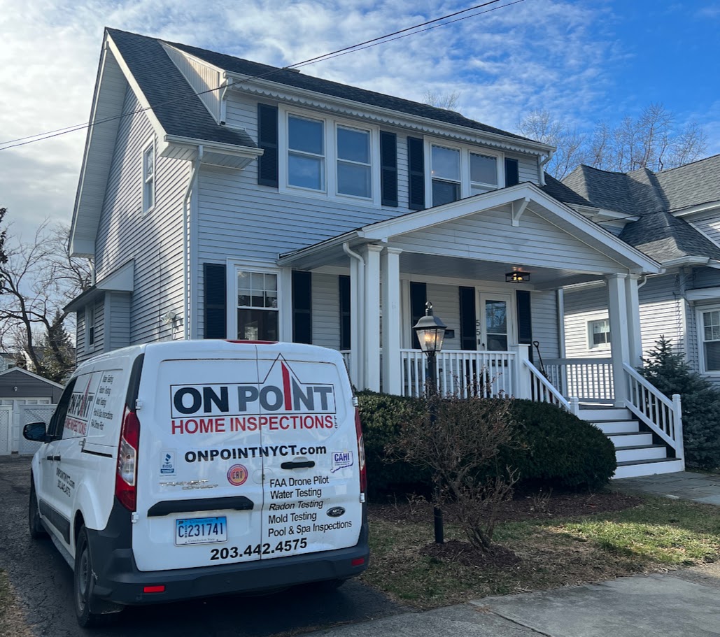 On Point Home Inspections - Service vehicle parked outside Connecticut residential property