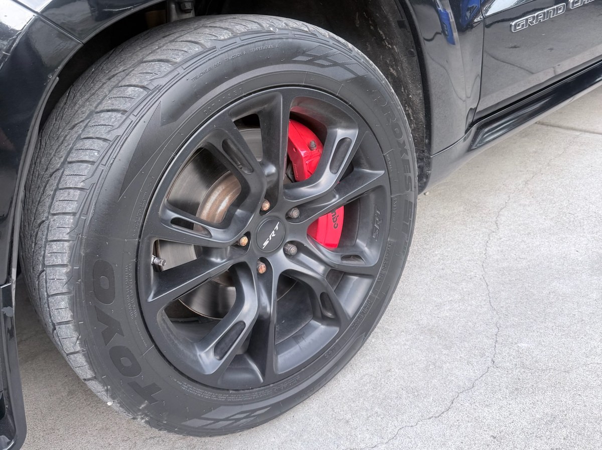 Before — Jeep Grand Cherokee wheel and tire exterior detail
