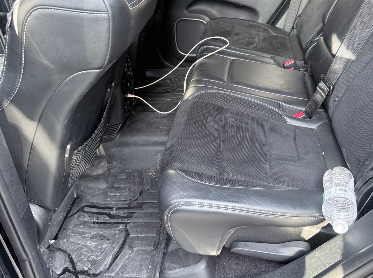 Before — Jeep Grand Cherokee back seat interior detail