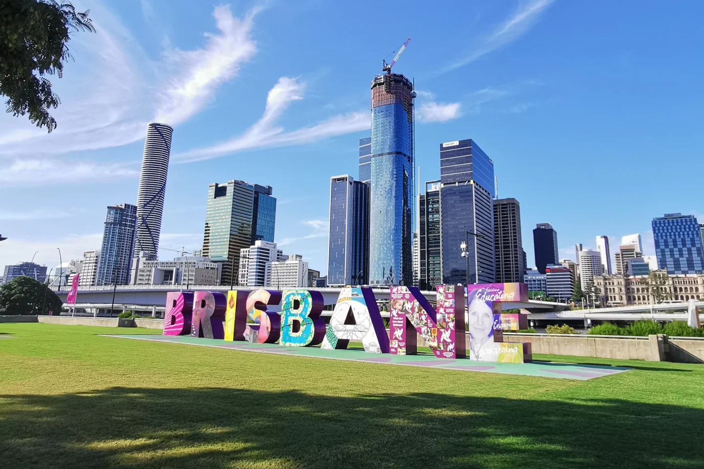 Brisbane city skyline and landmark sign representing SCKA's Brisbane service area