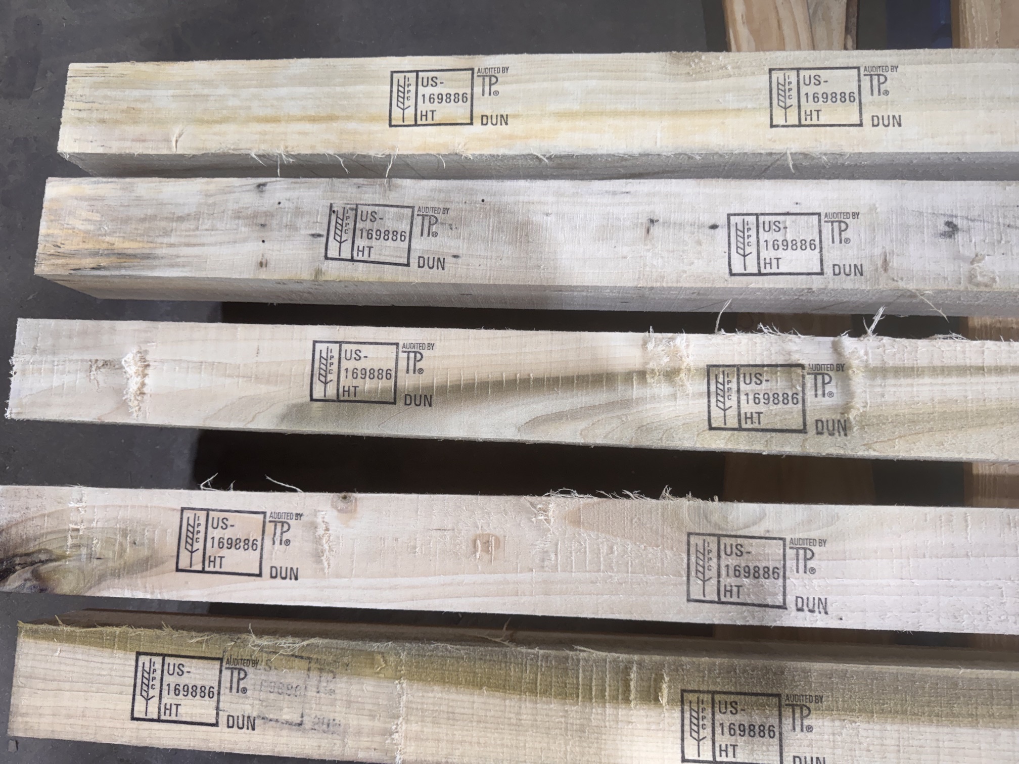 Heat-treated wood dunnage stamped with HT DUN marks