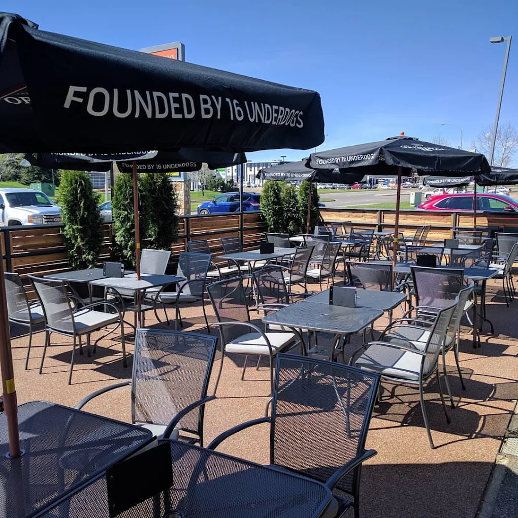 Sunlit patio seating in Sherwood Park at Headquarters