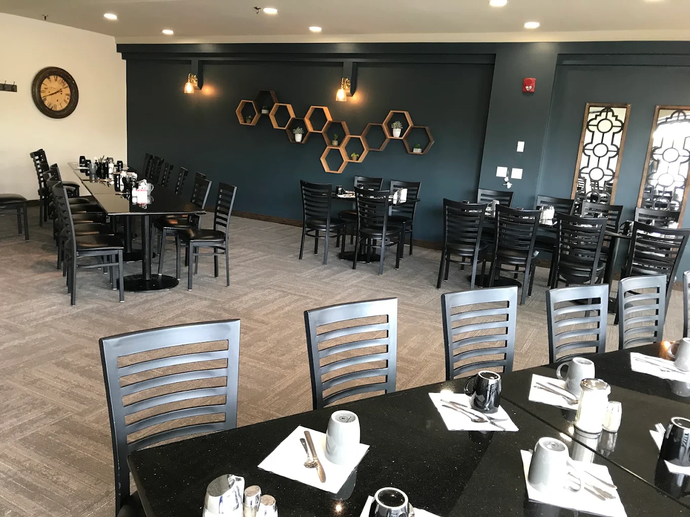 Private room banquet tables set for a group dinner