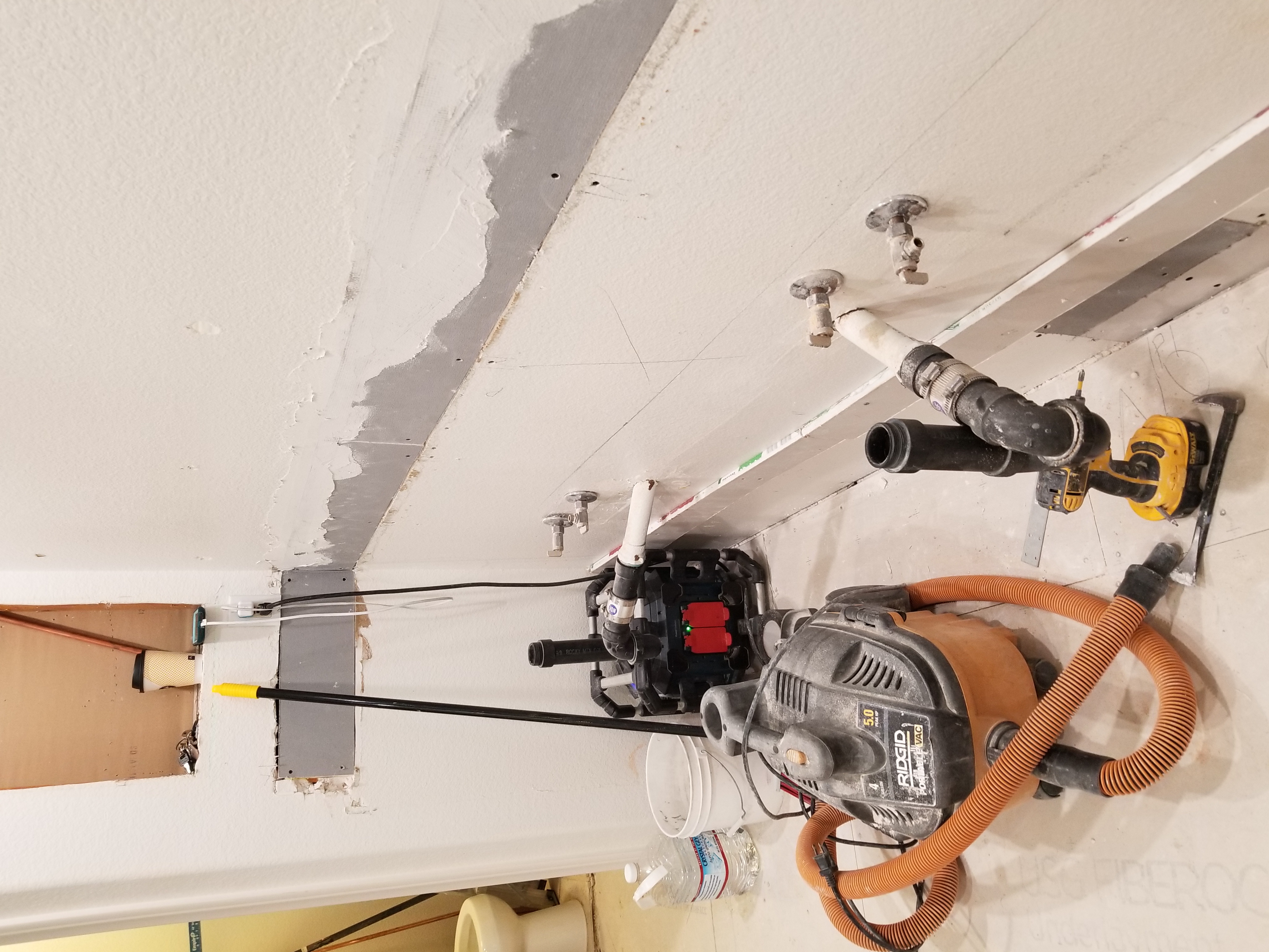 Under-Sink Dual Vanity Plumbing — completed by Lopez Handyman