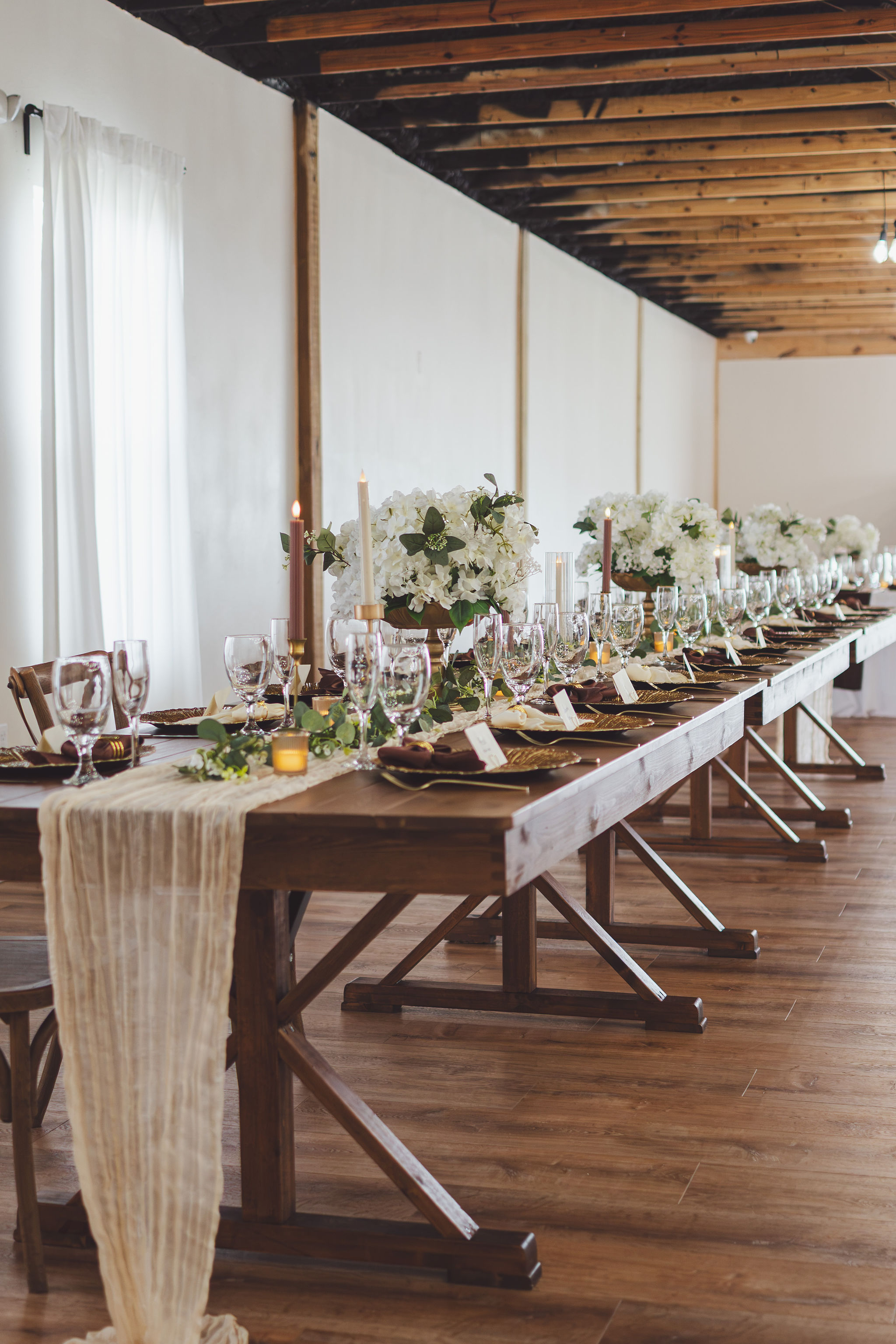 Elegant reception tablescape styled from the included decor collection at Cespedes Ranch