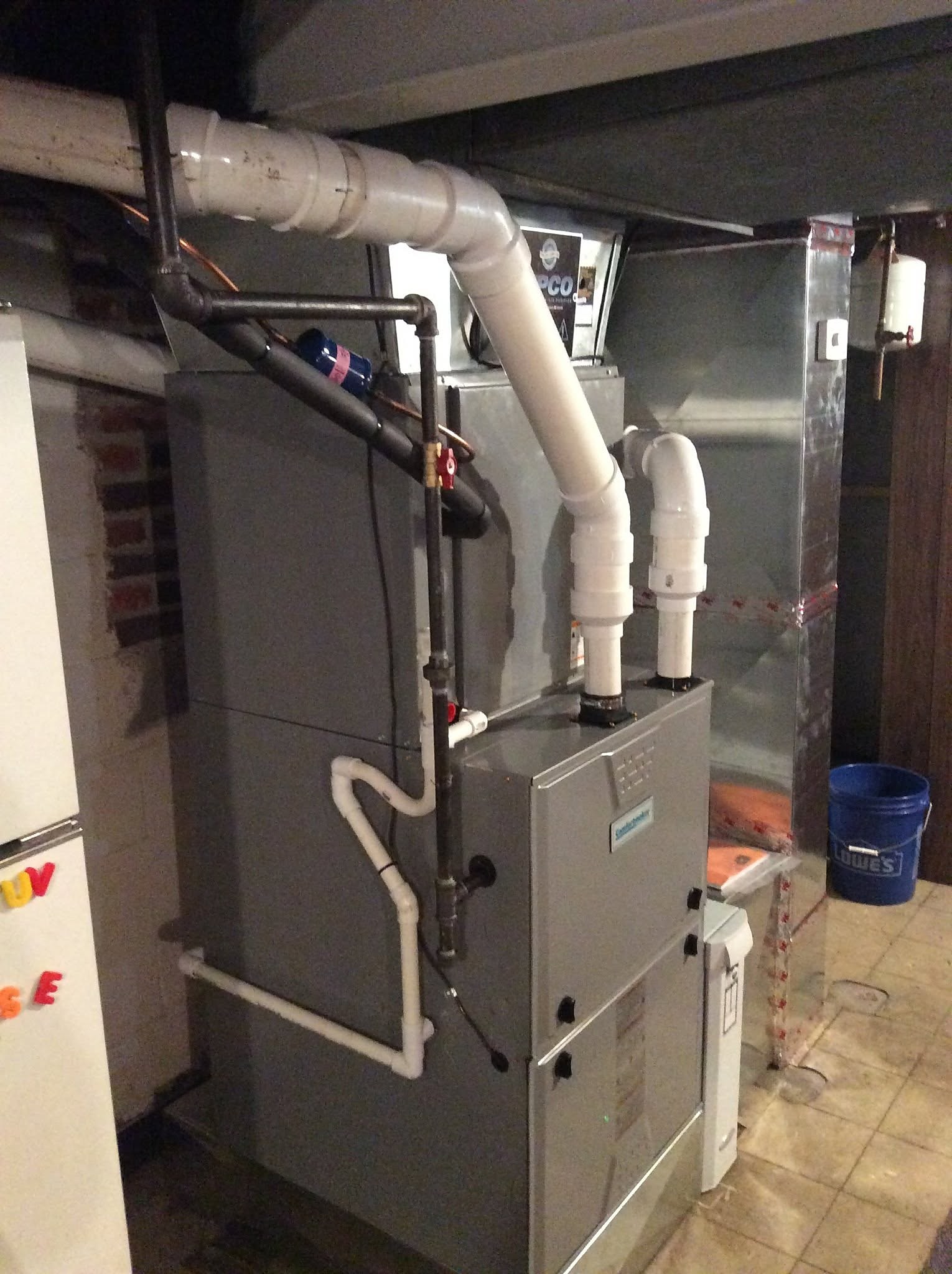 Residential heating and ventilation system in a basement