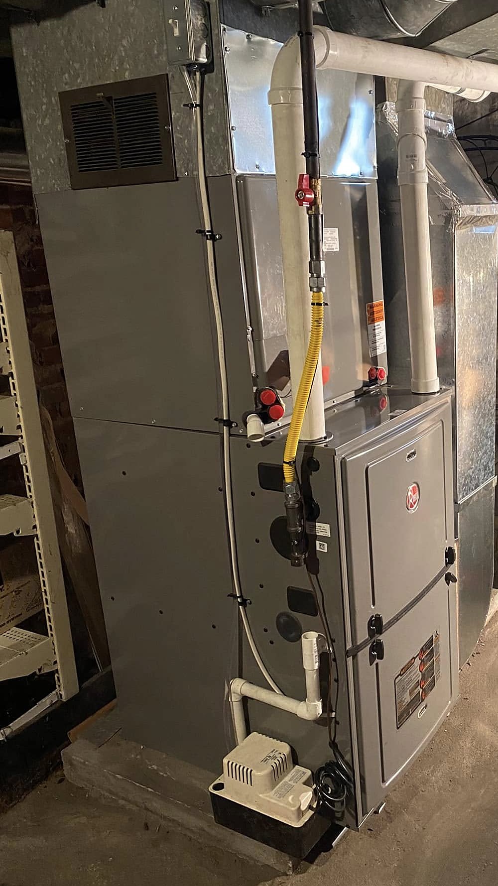 Residential gas furnace with a yellow appliance flex gas line connection