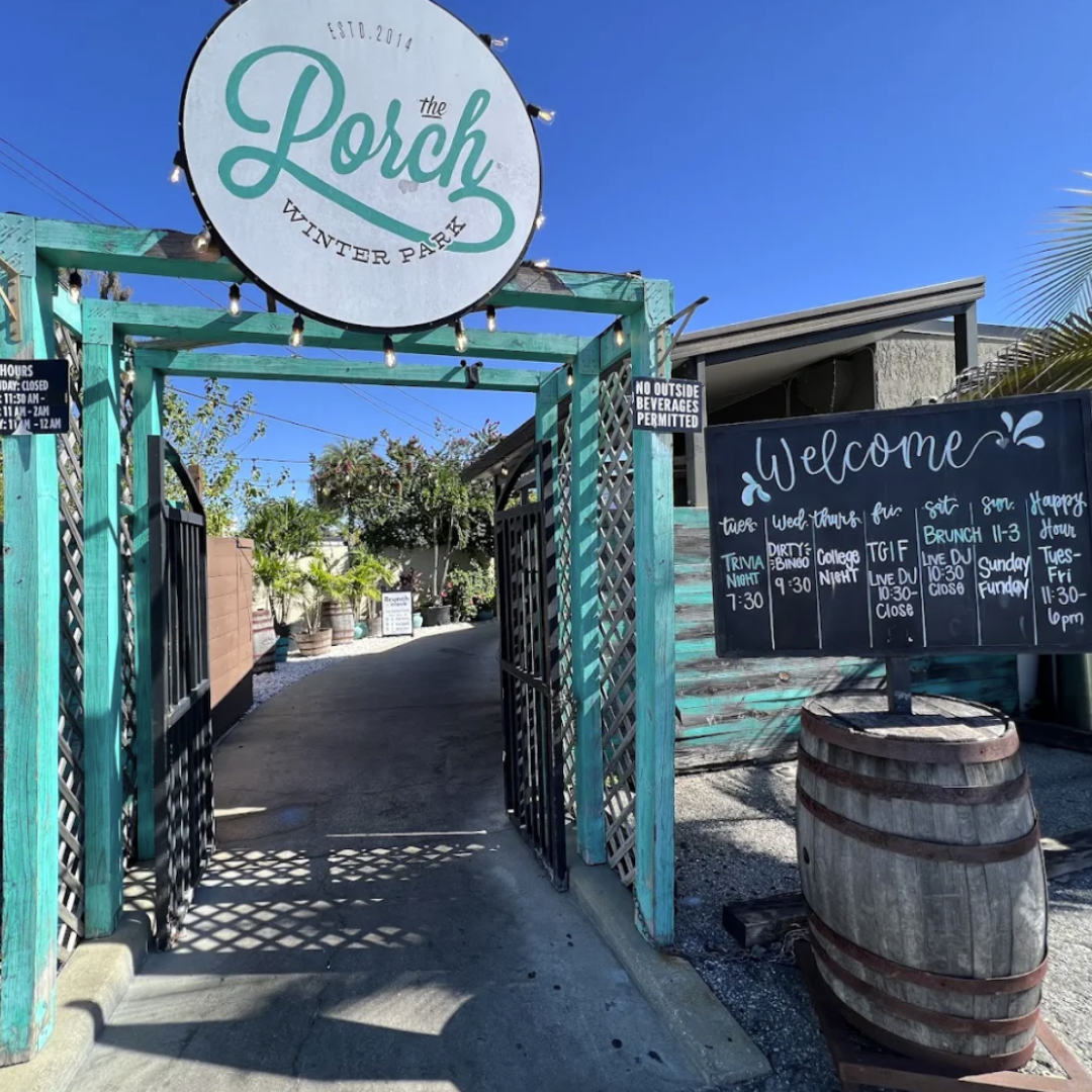 The Porch Winter Park entrance with trellis and patio