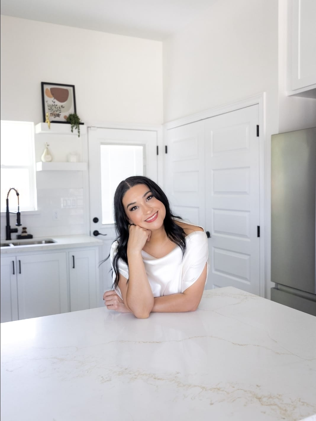 Mari Garza, real estate agent with SANETI Realty Group