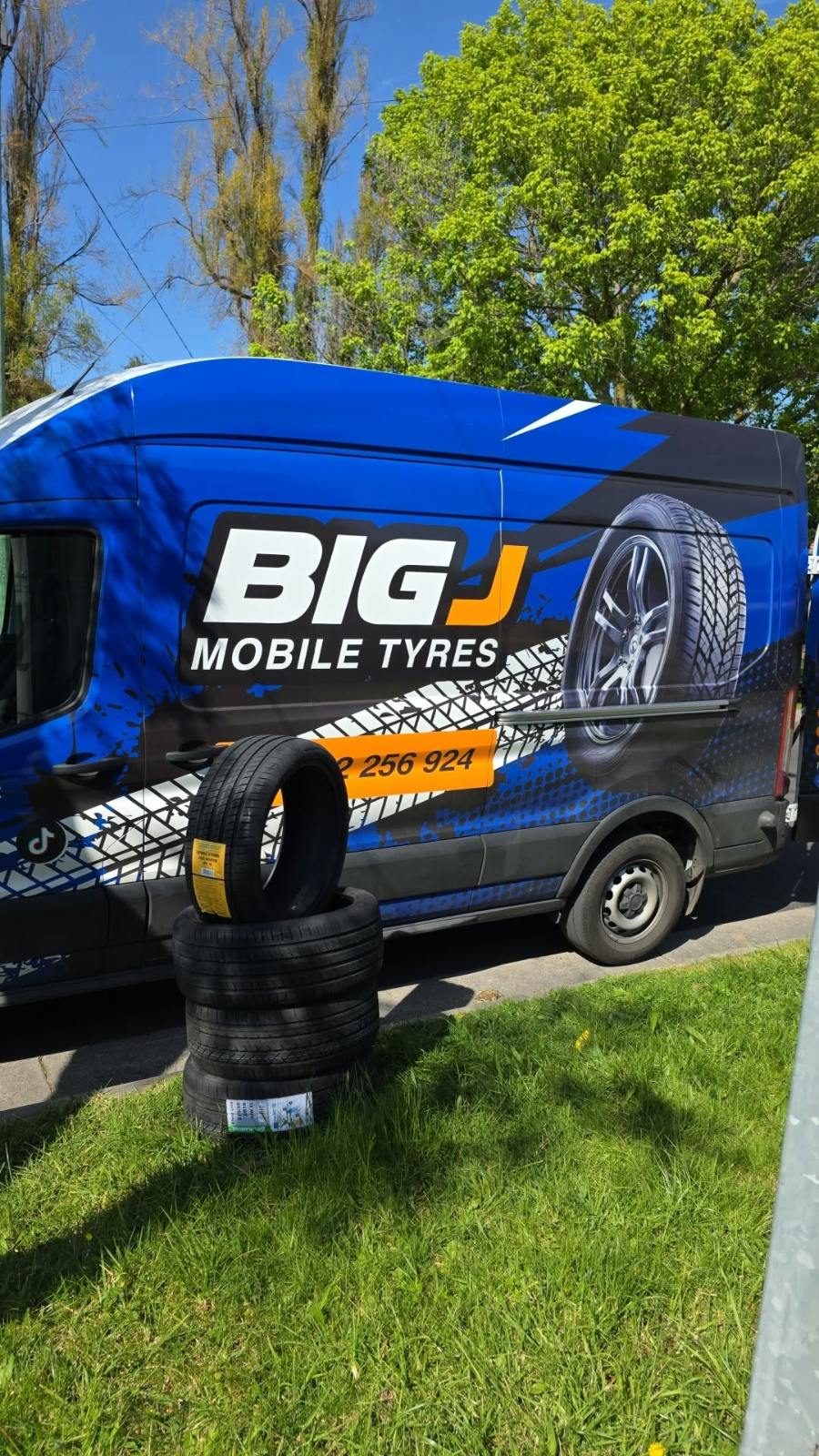 Big J branded mobile workshop van with fresh tyres ready for installation