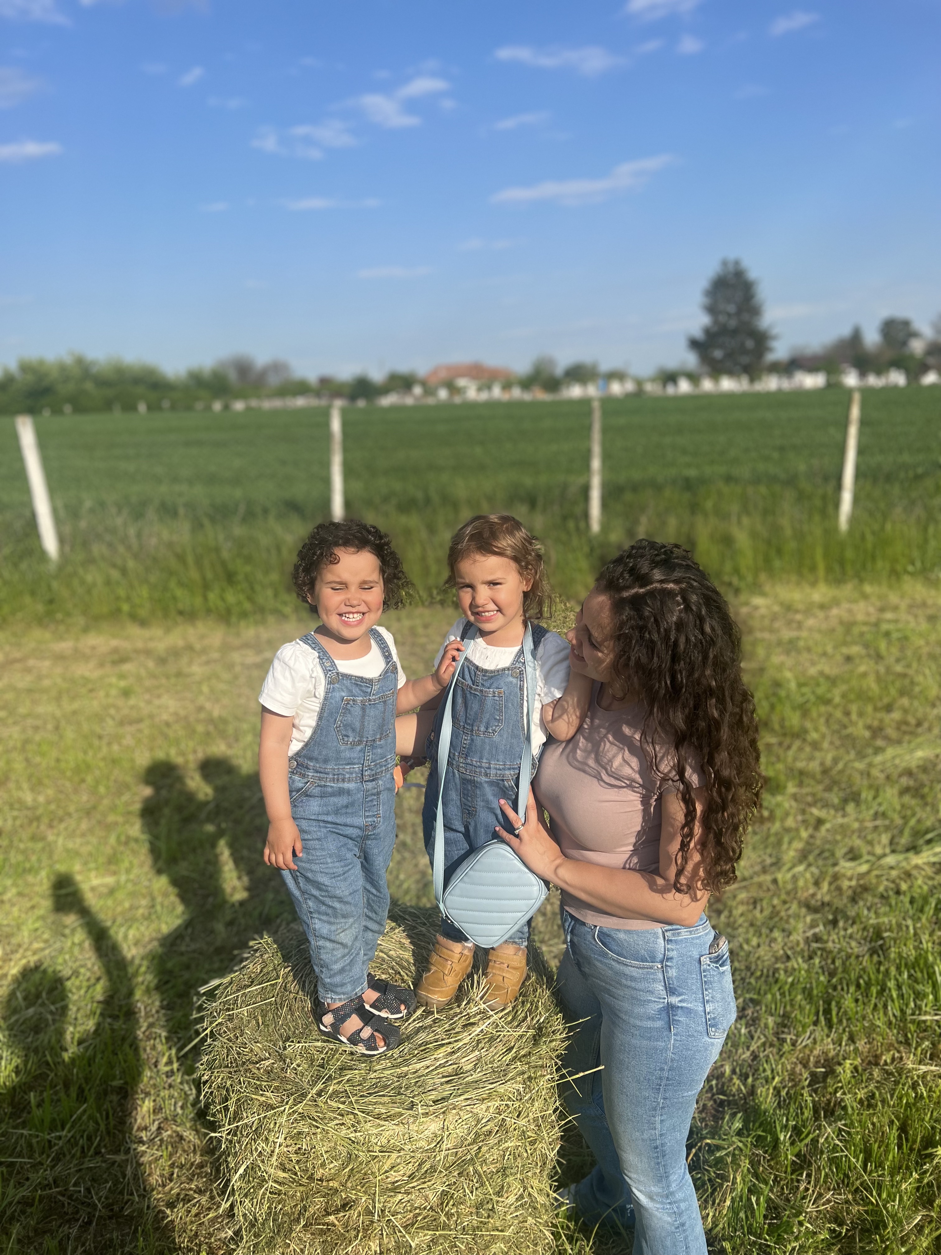 Yasmina Murphy with her twin daughters, Isabelle and Grace
