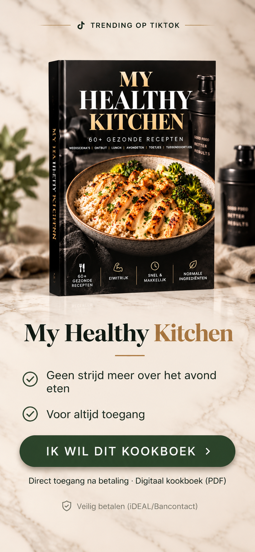 My Healthy Kitchen - Kookboek op marmeren aanrecht met plant en shaker