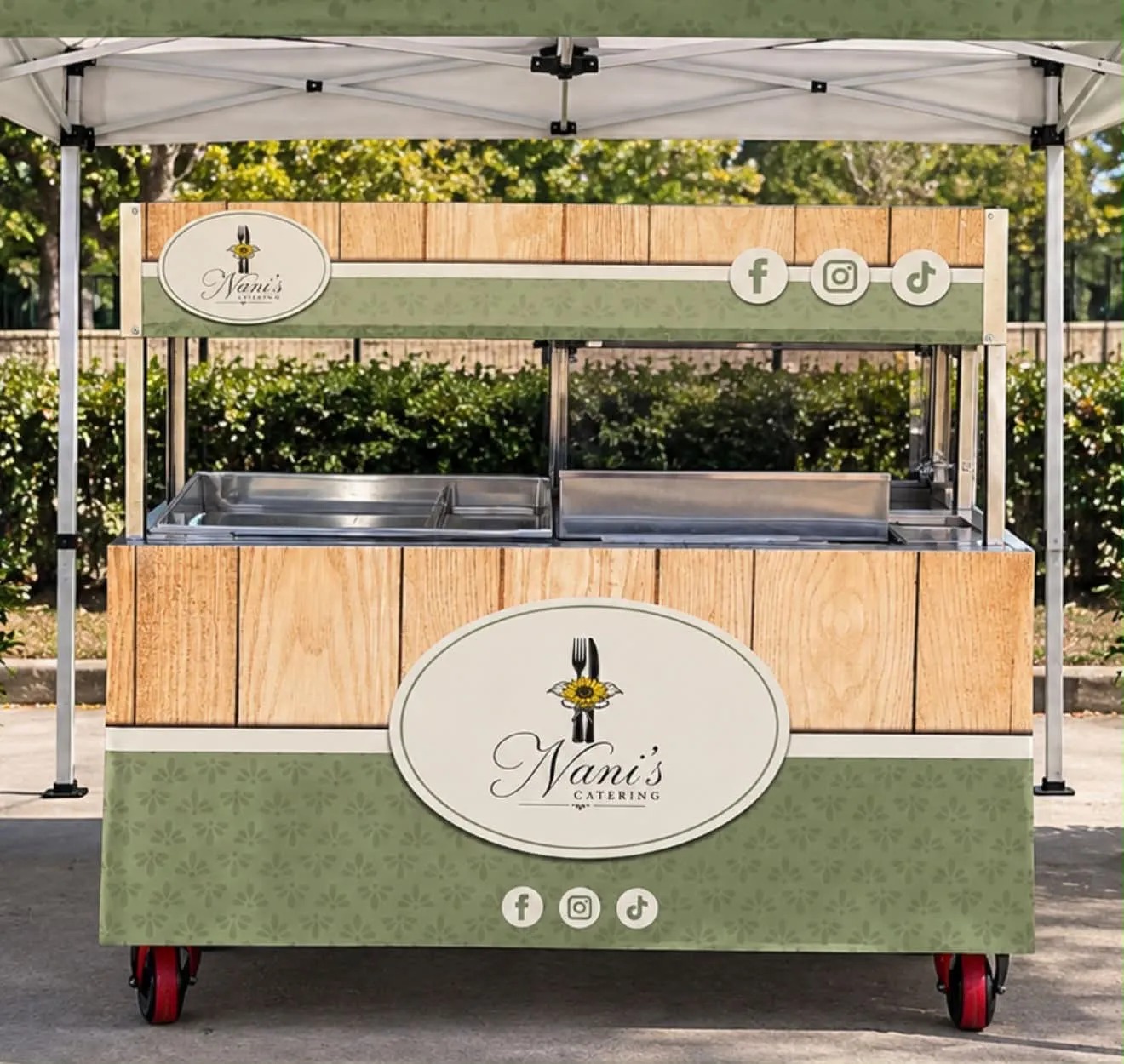 Jose Miguel Rivera Sanchez and Nani's Catering team at a live cooking station
