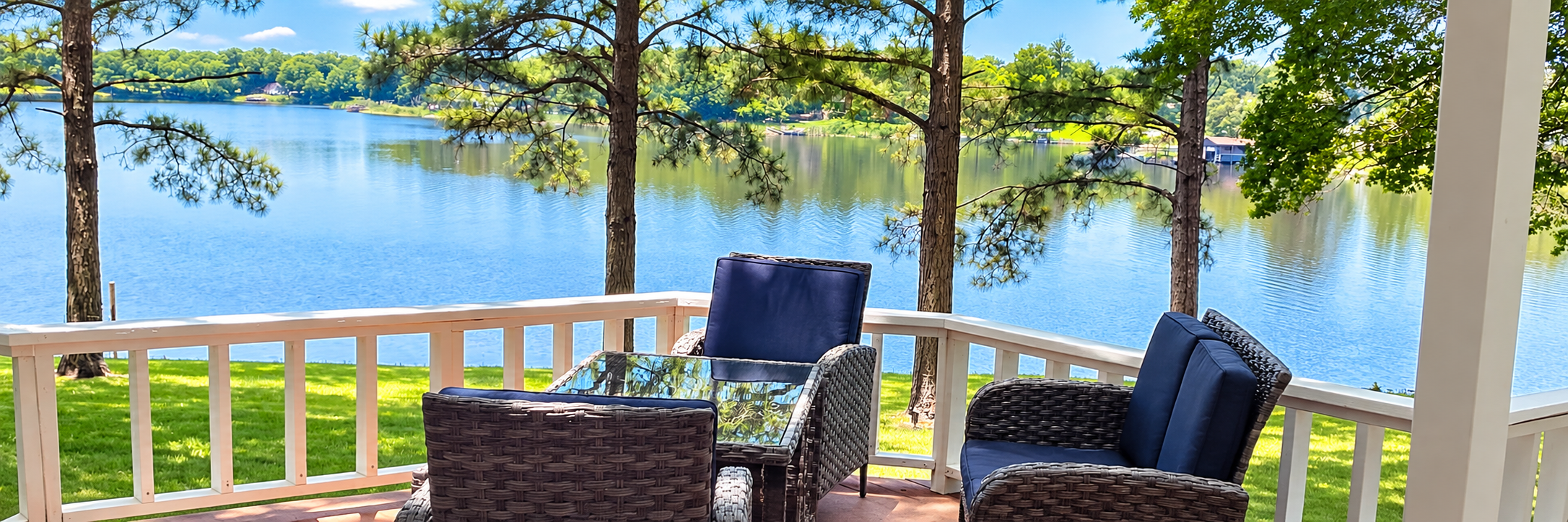 Scenic lakeside porch retreat overlooking peaceful blue waters and pine trees