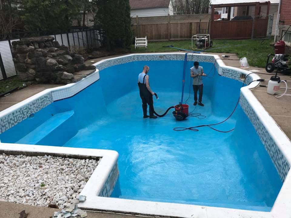 Drained swimming pool during the surface-preparation stage of a resurfacing project