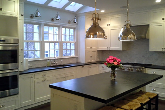Chris Jordan on site reviewing custom remodeling details