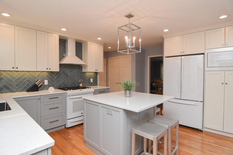 Stoughton custom kitchen renovation featuring island and tile backsplash