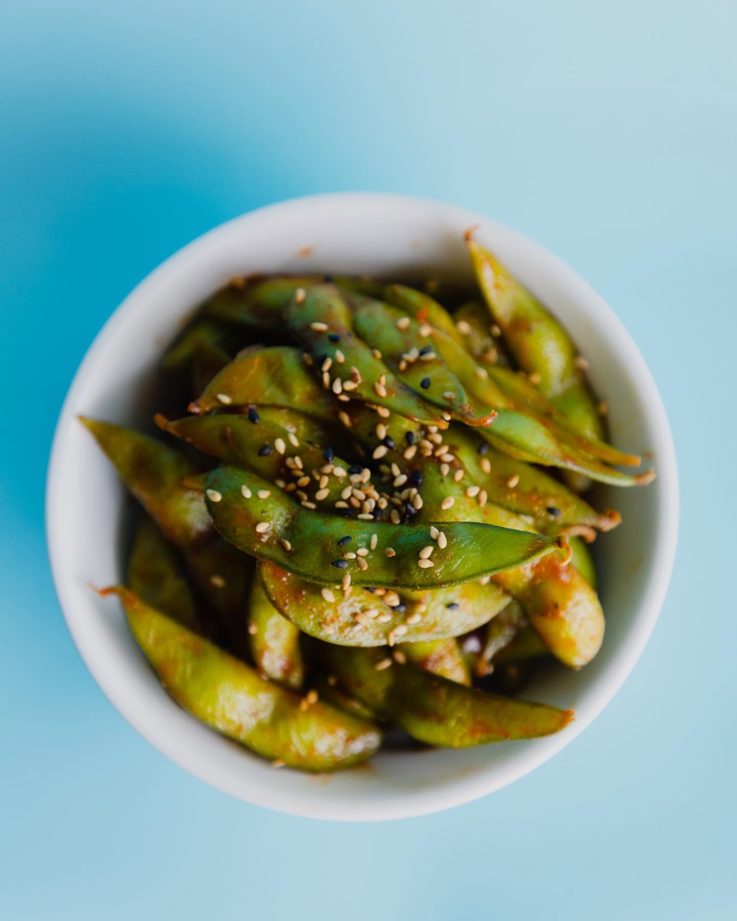 Steamed spicy edamame with sesame seeds at Nori sushi restaurant in Omaha