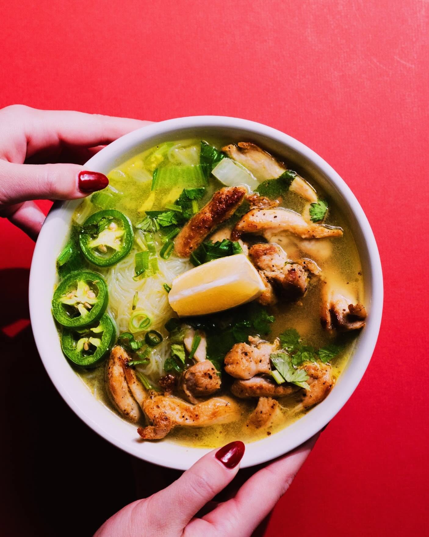 Warm chicken and noodle bowl with jalapenos and fresh lemon at Nori in Omaha