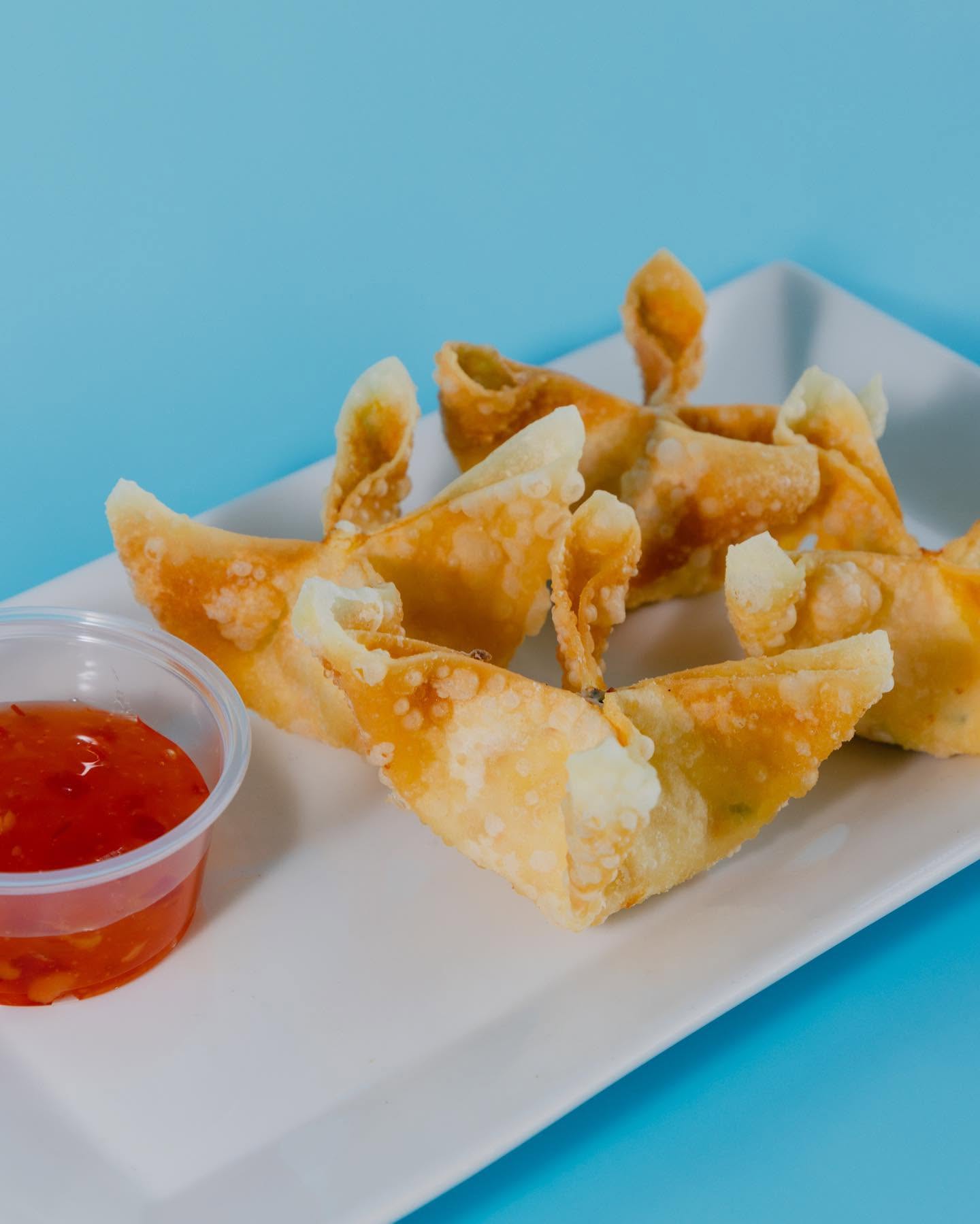 Crispy fried crab rangoon with sweet chili dipping sauce at Nori in Omaha
