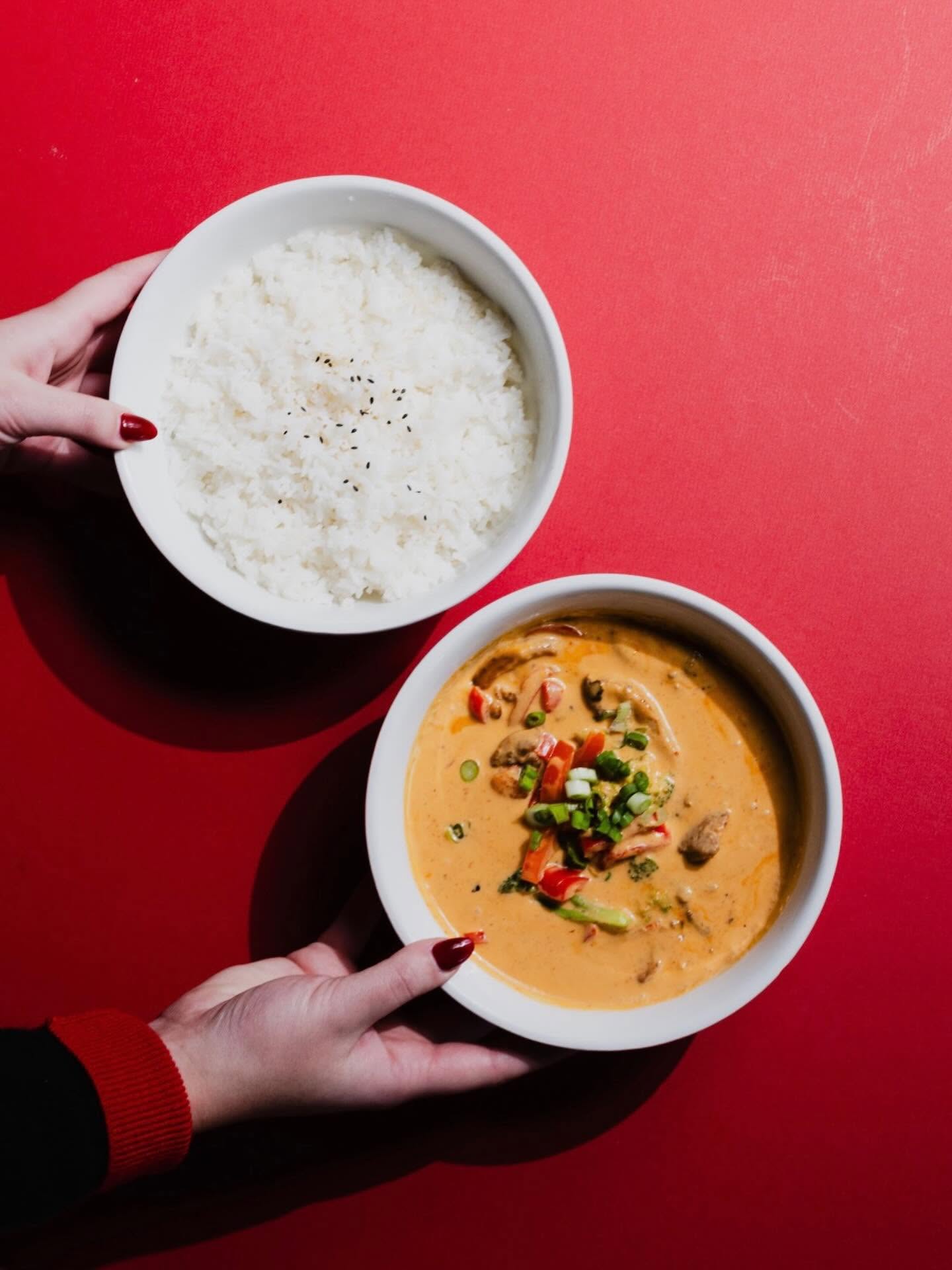 Creamy Panang curry bowl served with steamed white rice at Nori in Omaha