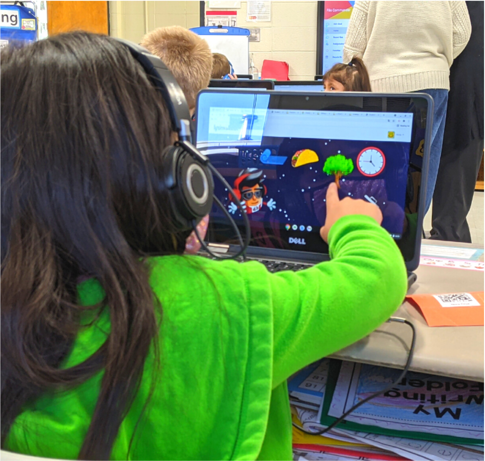 A student working independently through a Lyrics2Learn leveled reading track.