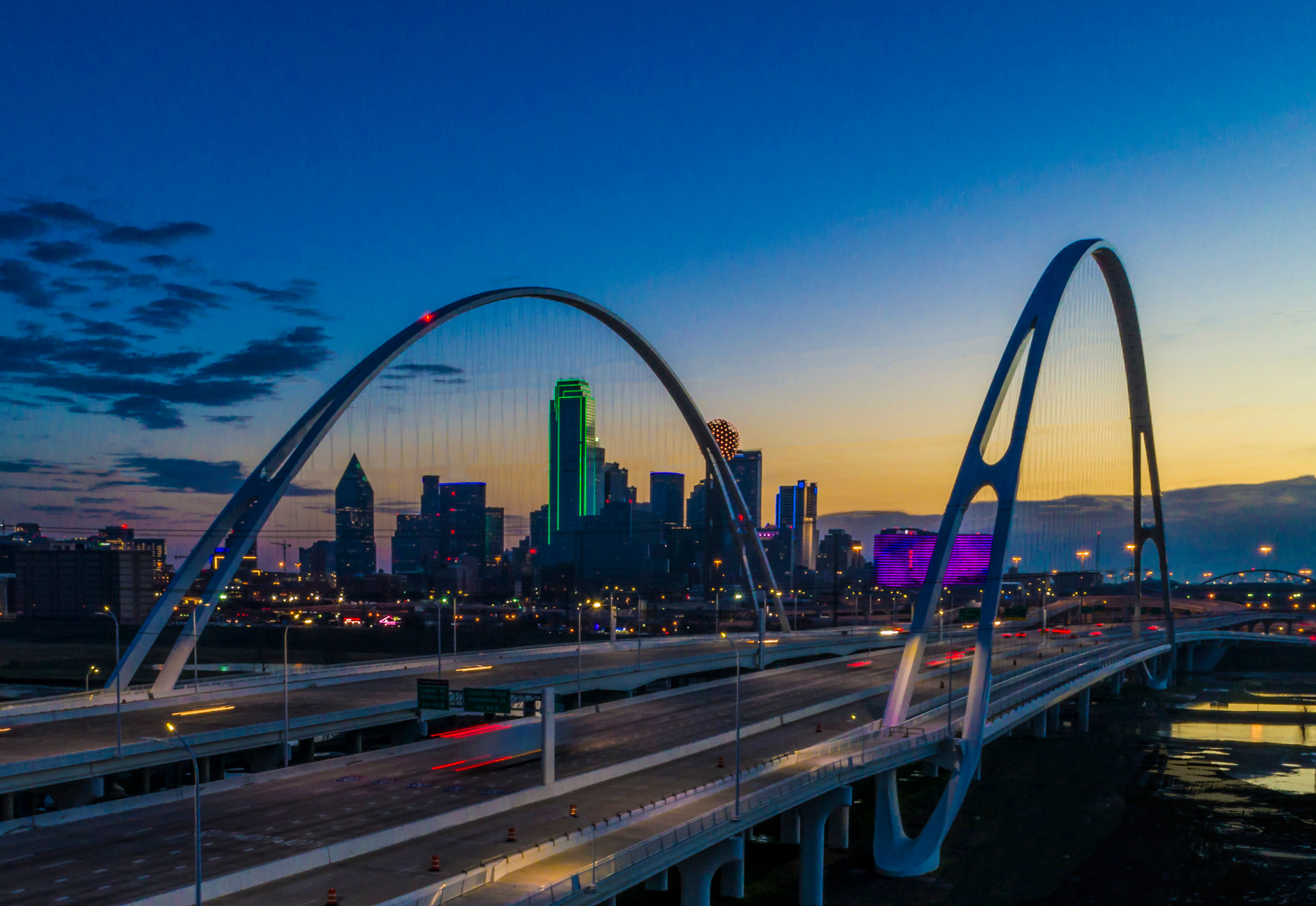 Dallas skyline and Margaret Hunt Hill Bridge at dusk
