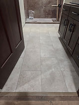 Tile-look luxury vinyl tile flooring in a residential hallway