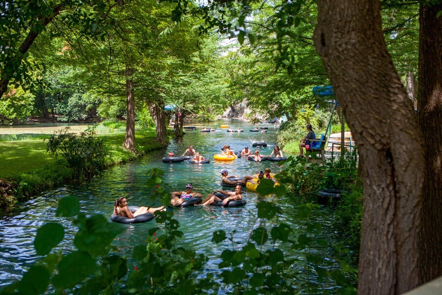 Schlitterbahn New Braunfels waterpark river rides and tube chutes winding through lush Hill Country landscape