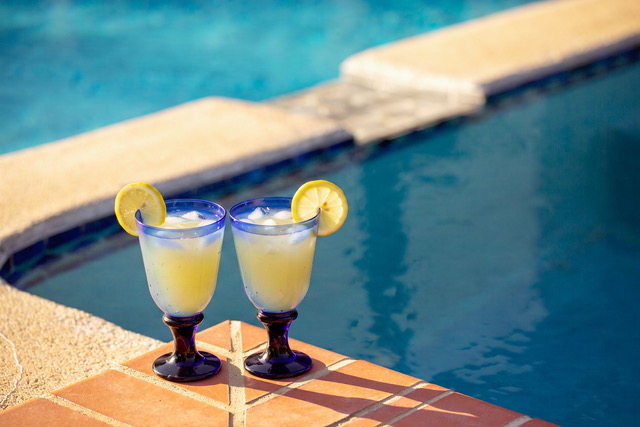 Refreshing chilled drinks poolside by crystal clear turquoise waters at The Point CLTX