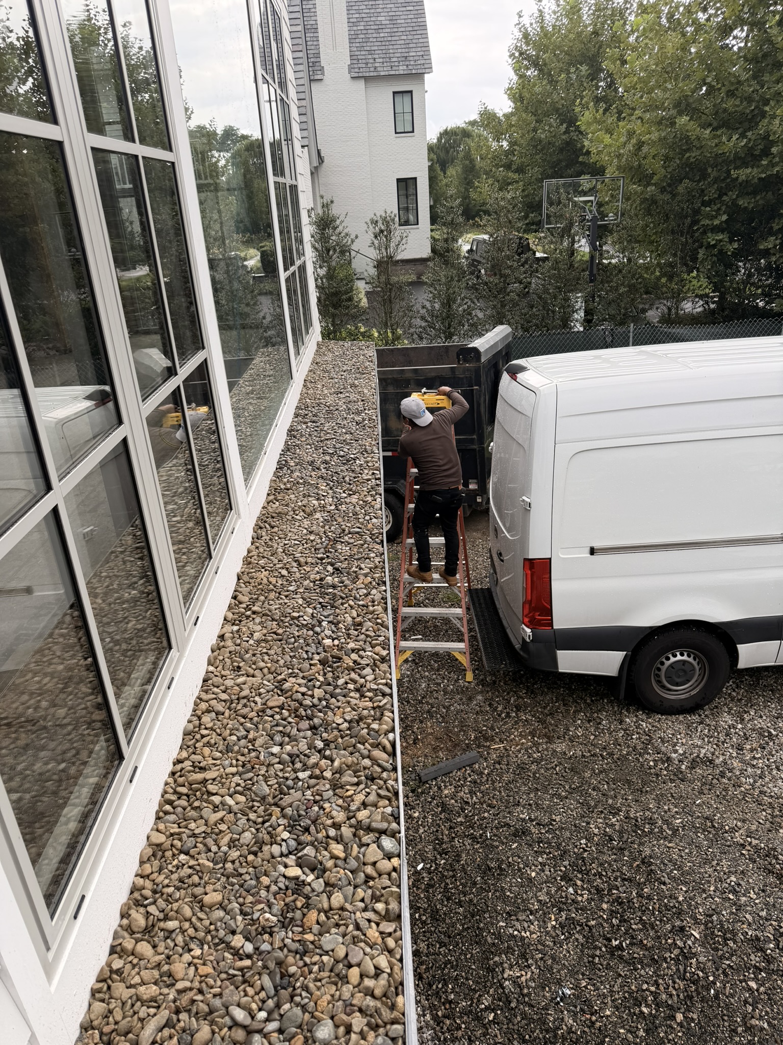 Ballasted Stone Flat Roof Water Drainage & Parapet Detail