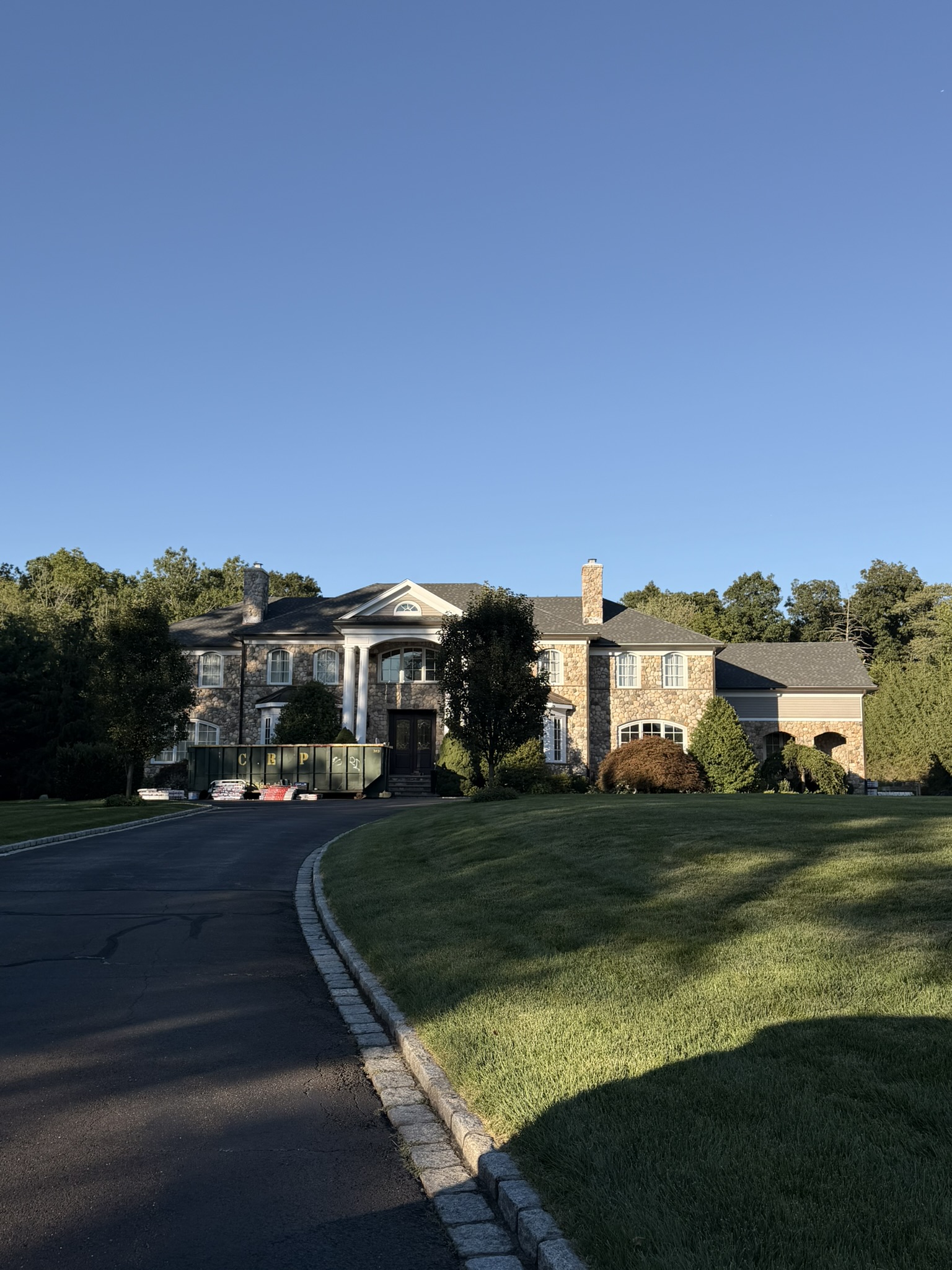 Luxury Stone Manor Roof Replacement & Architectural Detailing