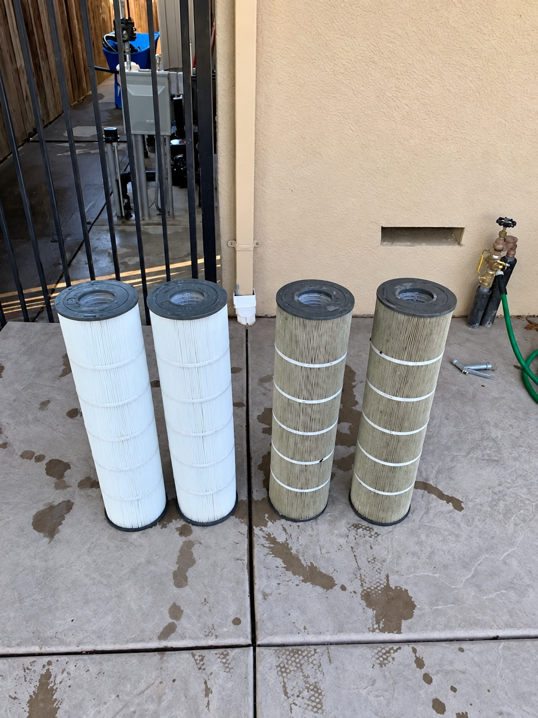 Freshly cleaned and serviced pool filter cartridges