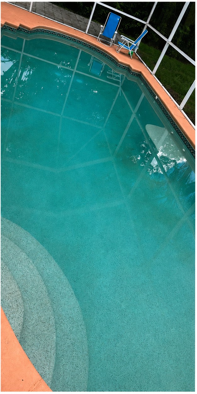 Restored crystal clear swimming pool after Baywatch Pools recovery