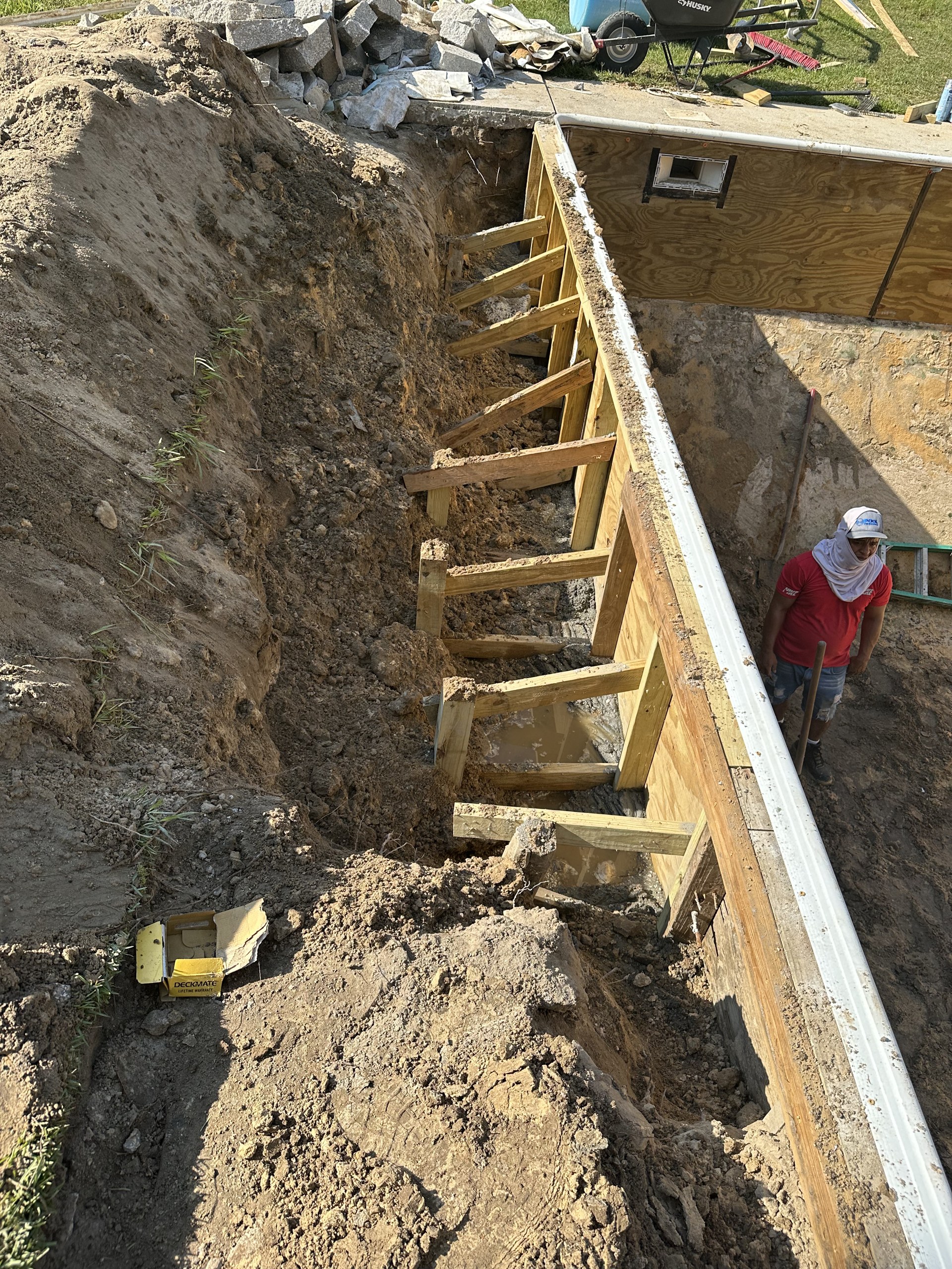 Active pool construction excavation and wall form installation