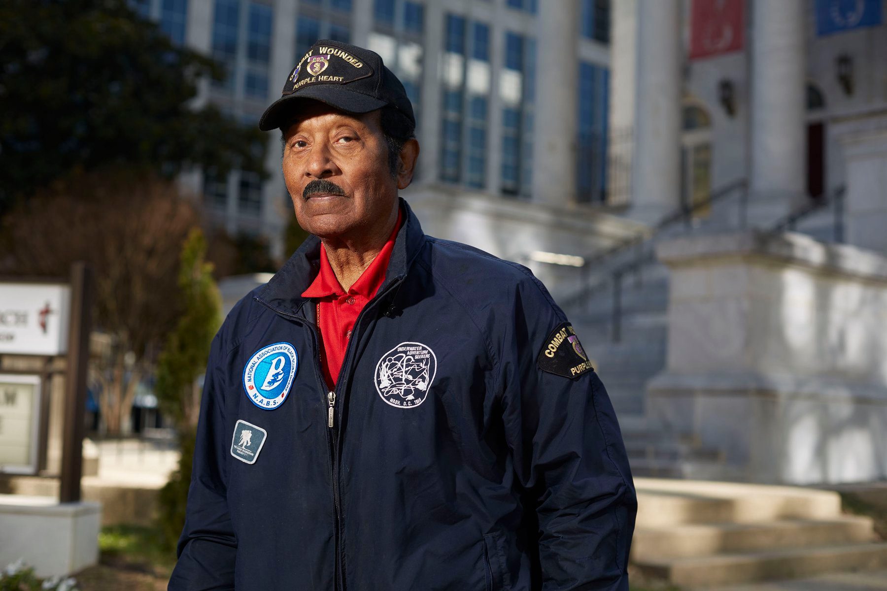Dr. Albert José Jones wearing his Combat Wounded Purple Heart cap