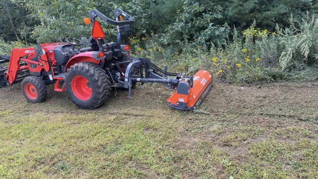 Heavy-Duty Flail Mower & Tractor Clearing Rough Field Border