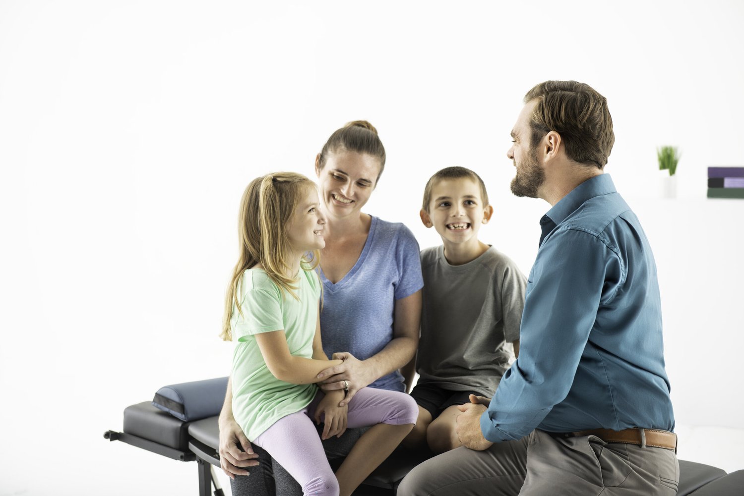 Dr. Scott Kirchner with a family during a visit