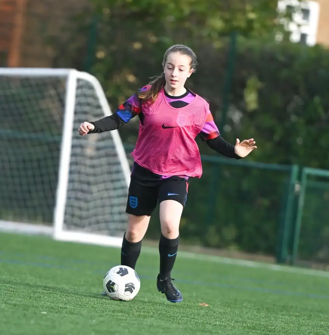 Girls football coaching at GoldStars in Esher.