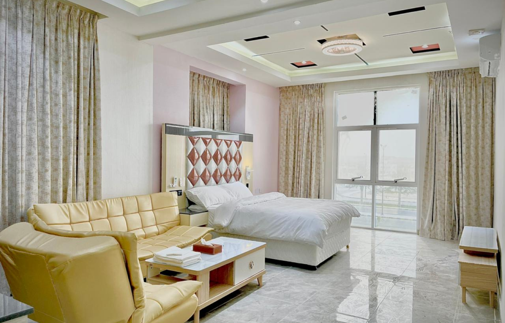 Suite room with warm wood finishes