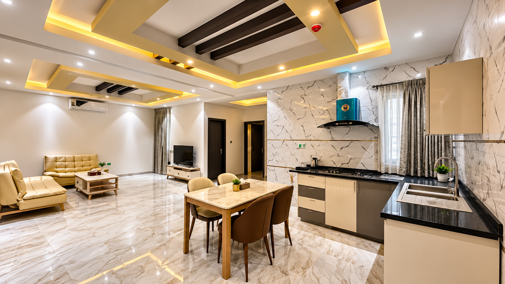 Asian Hotel Duqm apartment living room and kitchen