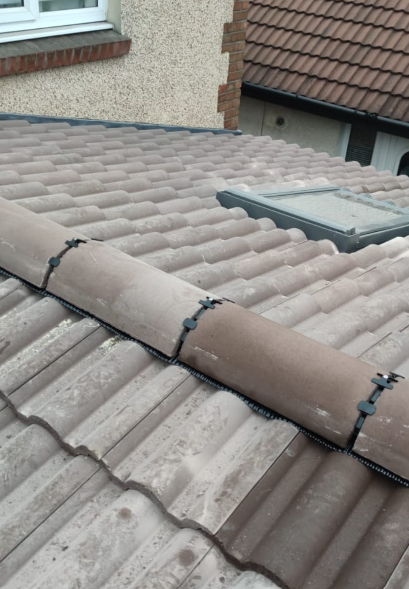 Mechanical ventilated dry ridge system installed along roof apex by Smart Roofing Glasgow