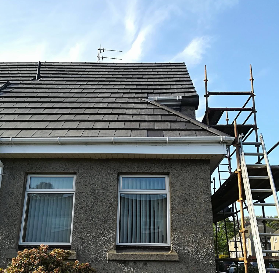 Modern flat interlocking roof tiles, guttering and scaffolding installation by Smart Roofing Glasgow