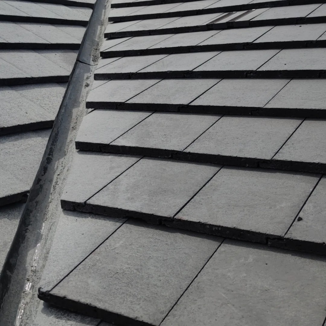 Precision cut valley tiles and lead gulley by Smart Roofing Glasgow