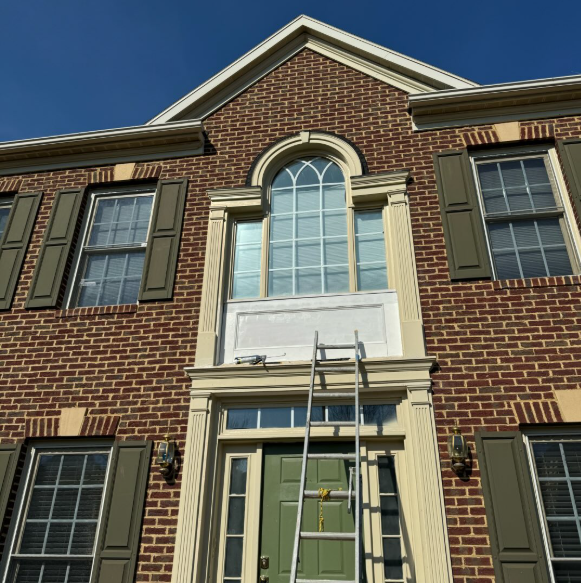 Exterior home trim restoration, window framing and exterior painting project in Virginia