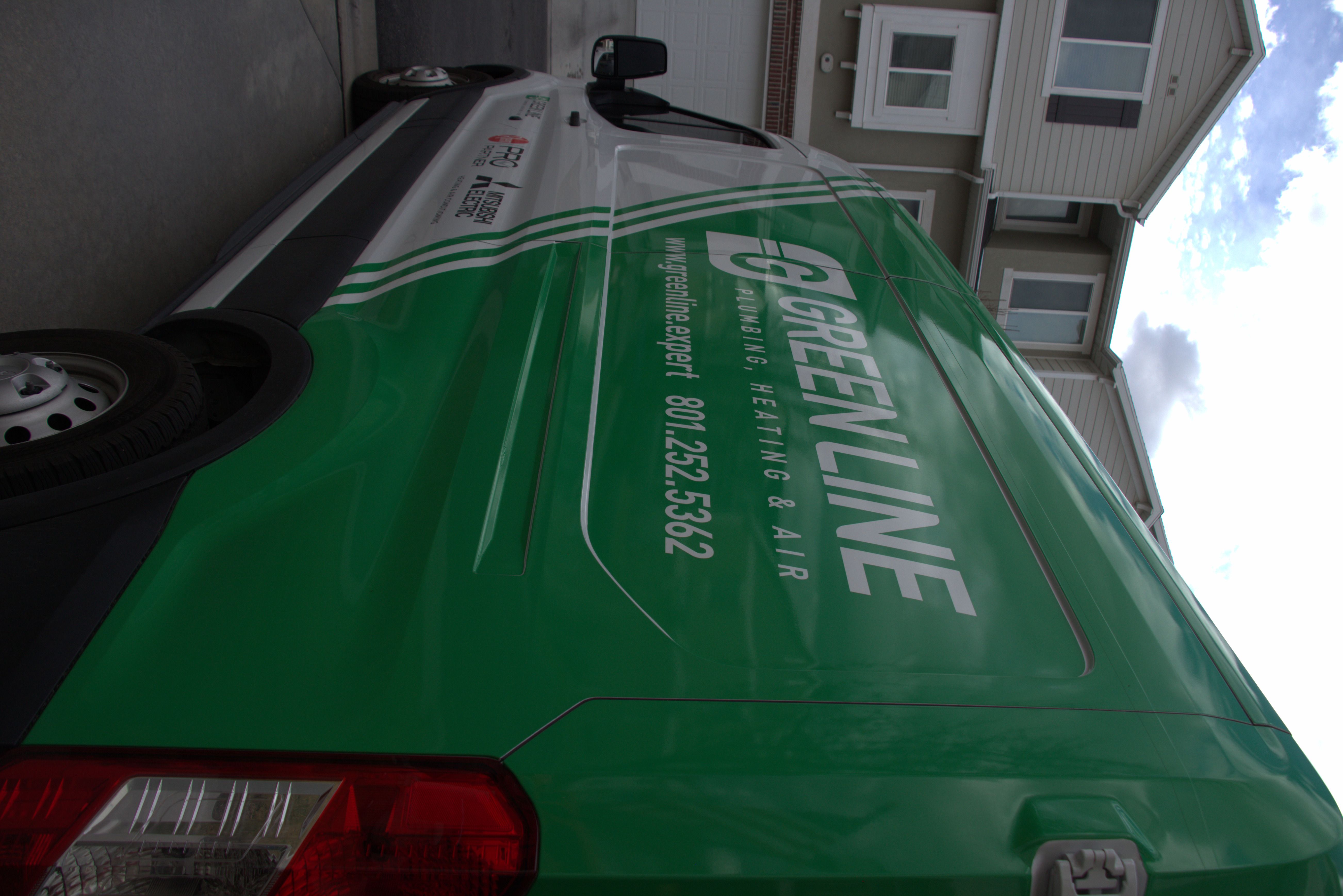Green Line Plumbing, Heating & Air service fleet operating across Salt Lake and Utah counties