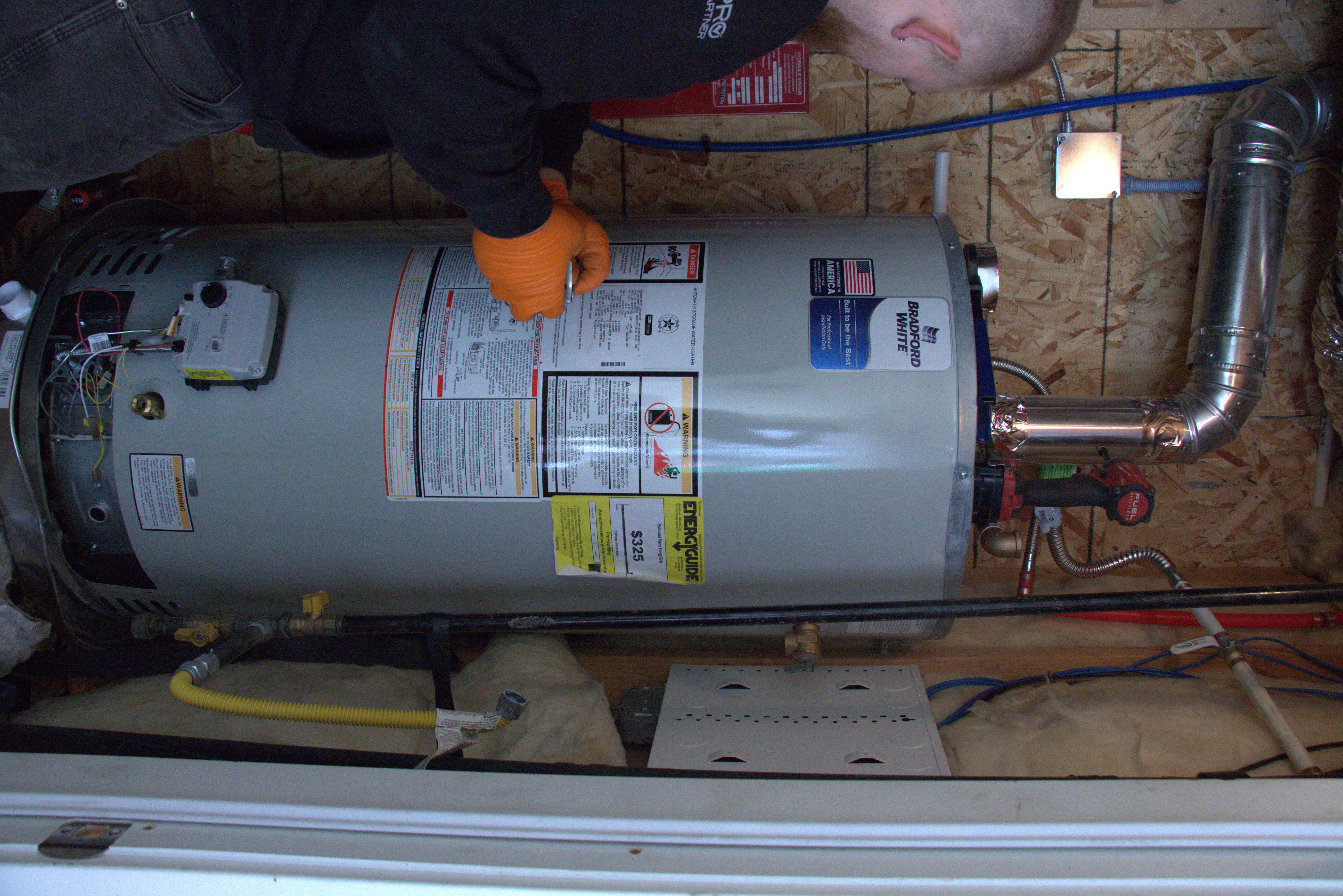 Bradford White natural gas water heater installation and venting connection in a Utah home