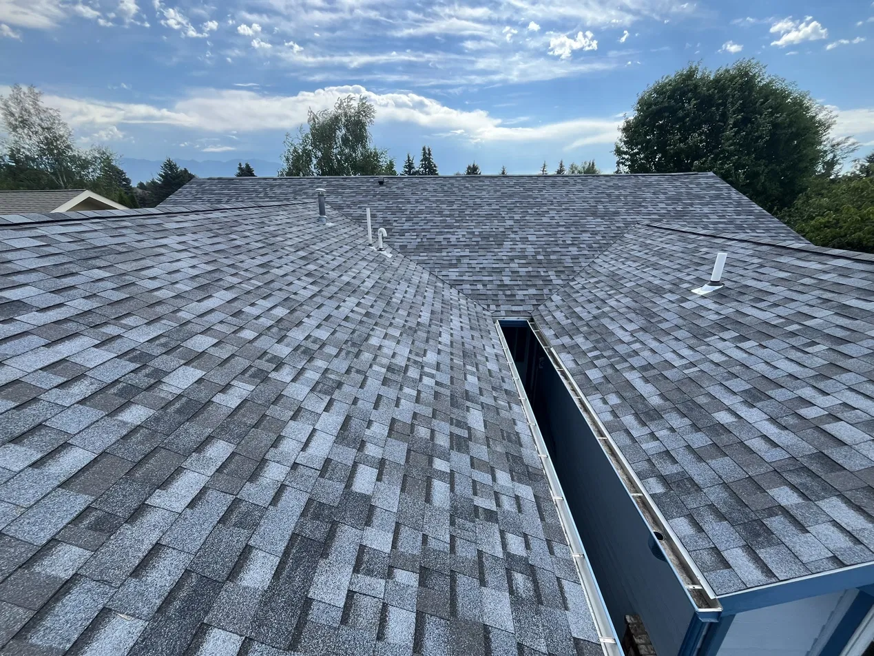 Completed asphalt shingle roof with vents and valleys, Flathead Valley, Montana